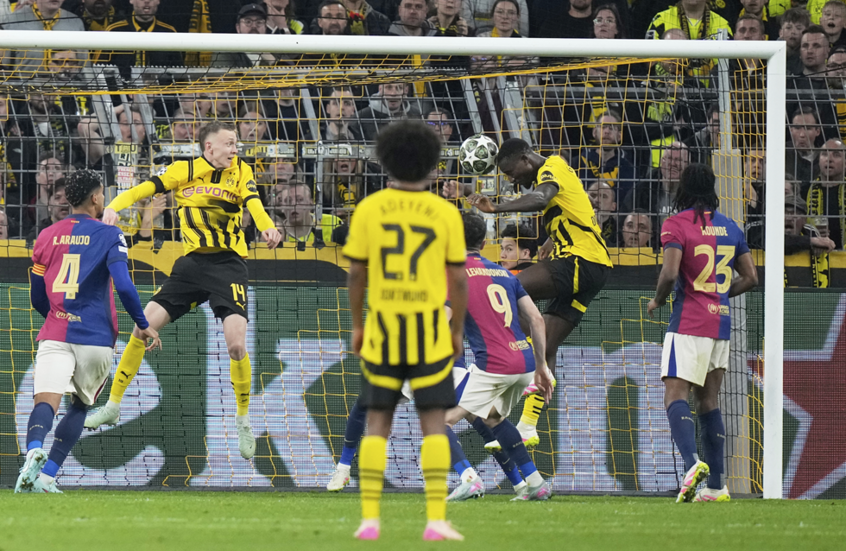 Guirassy's hat-trick gives Dortmund a morale win over Barcelona 